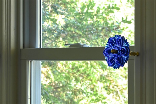 The house features exquisite details such as Victorian glass curtain ties in every room. 