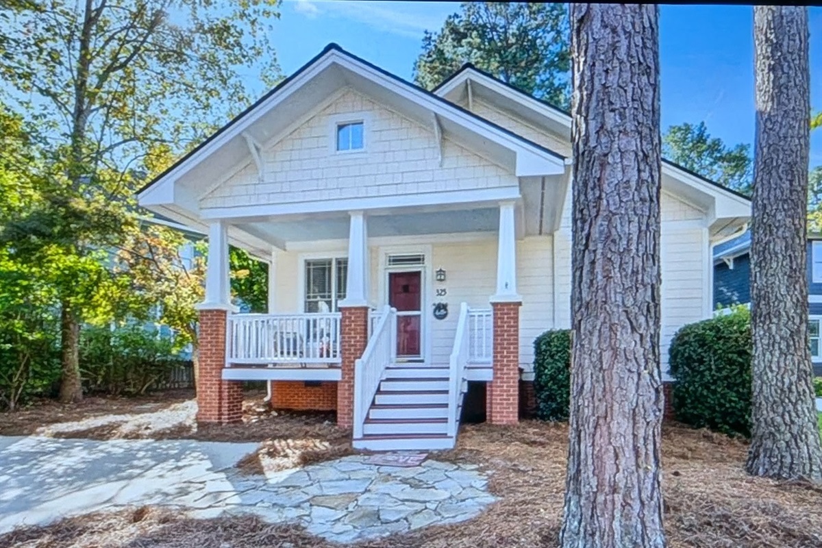 Beautiful cottage in quiet neighborhood with mature trees. Located in heart of Apex.