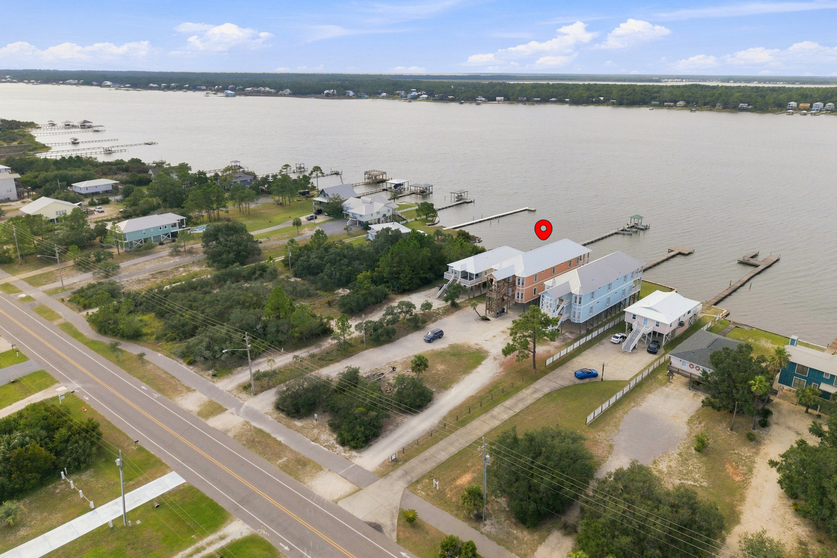 Aerial of the Little Lagoon neighborhood with the Gulf beyond