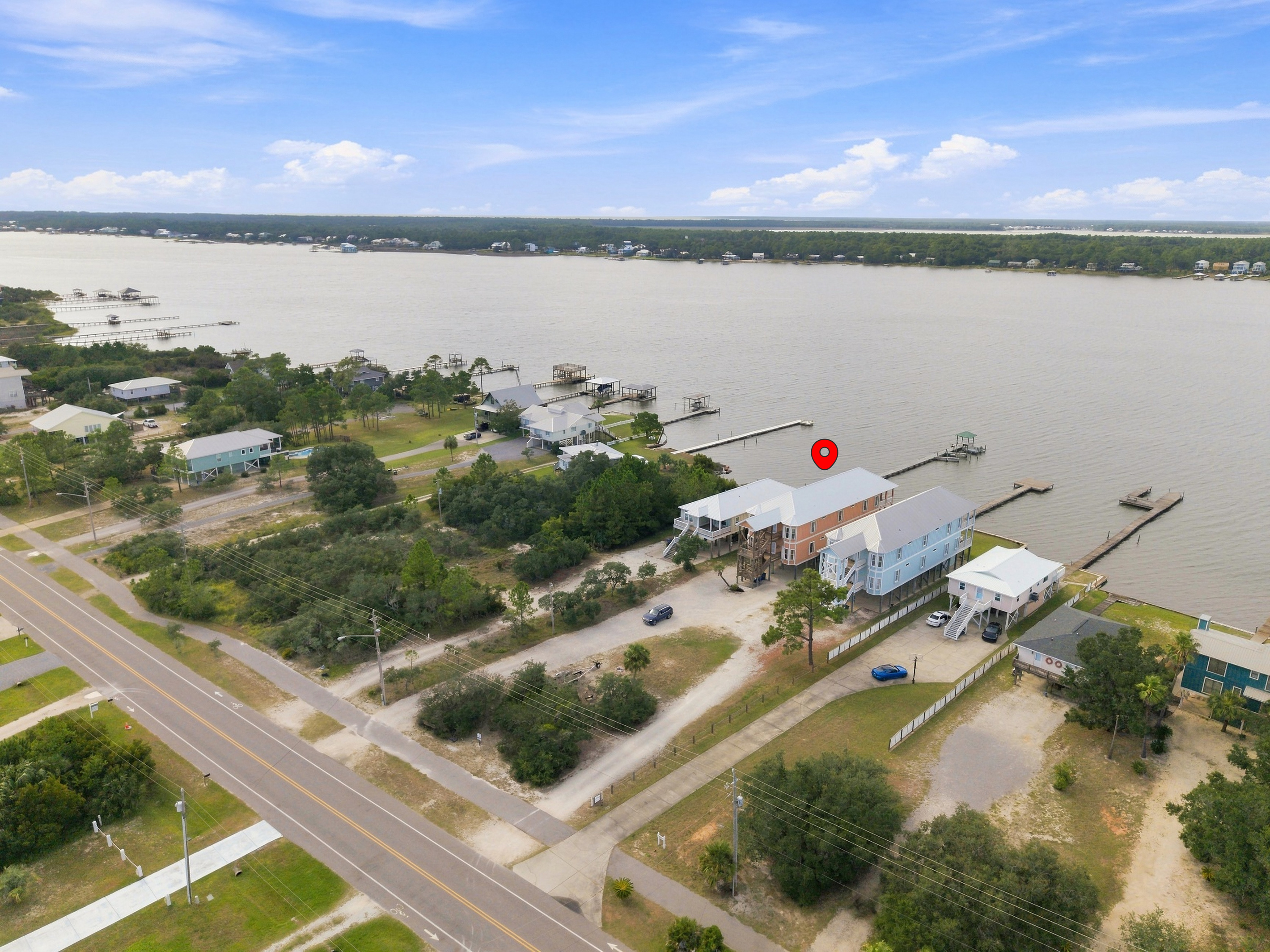 Aerial of the Little Lagoon neighborhood with the Gulf beyond