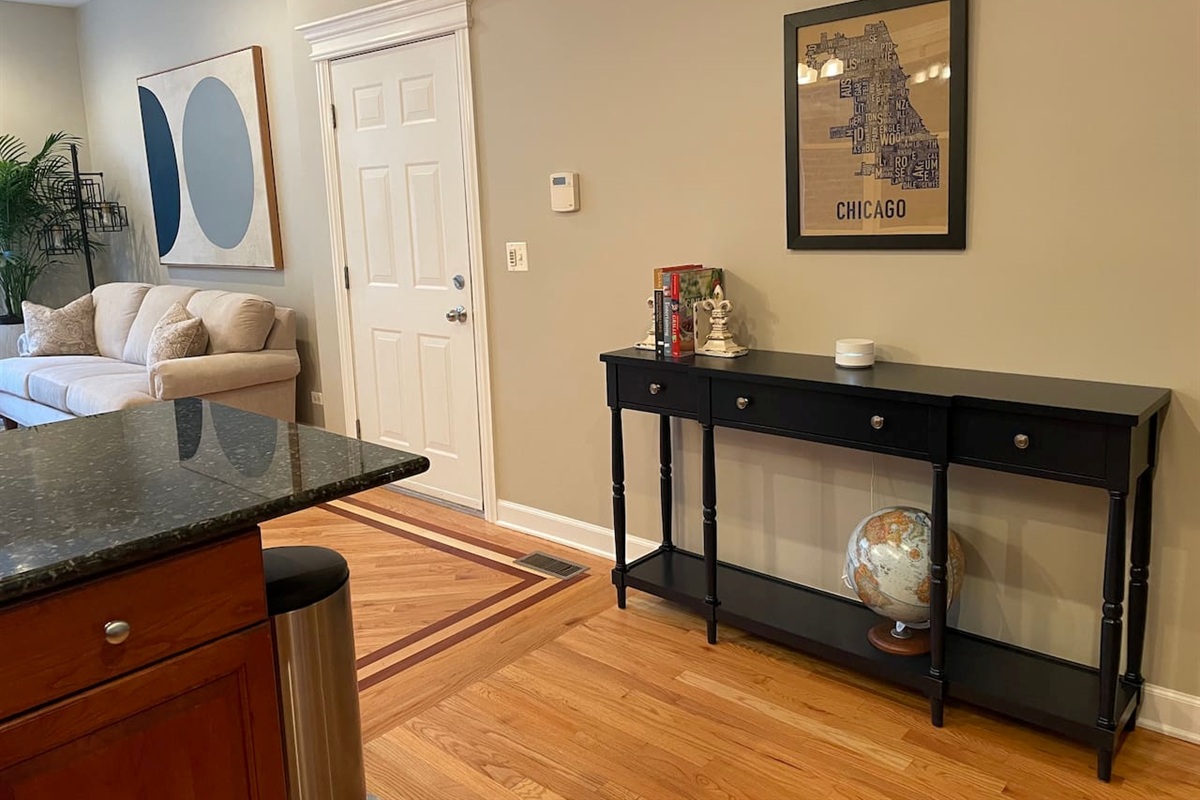 Integrated Kitchen and living room area creating a welcoming and comfortable Chicago stay.