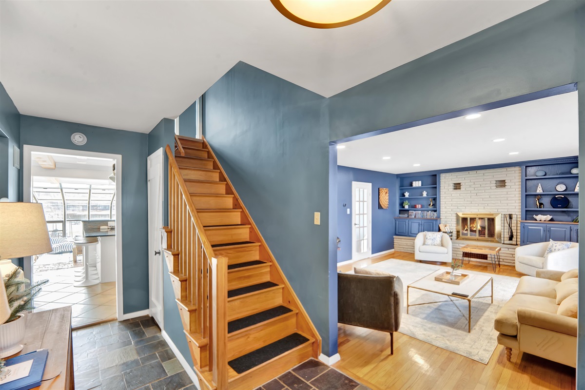 Bright entry staircase — warm and welcoming