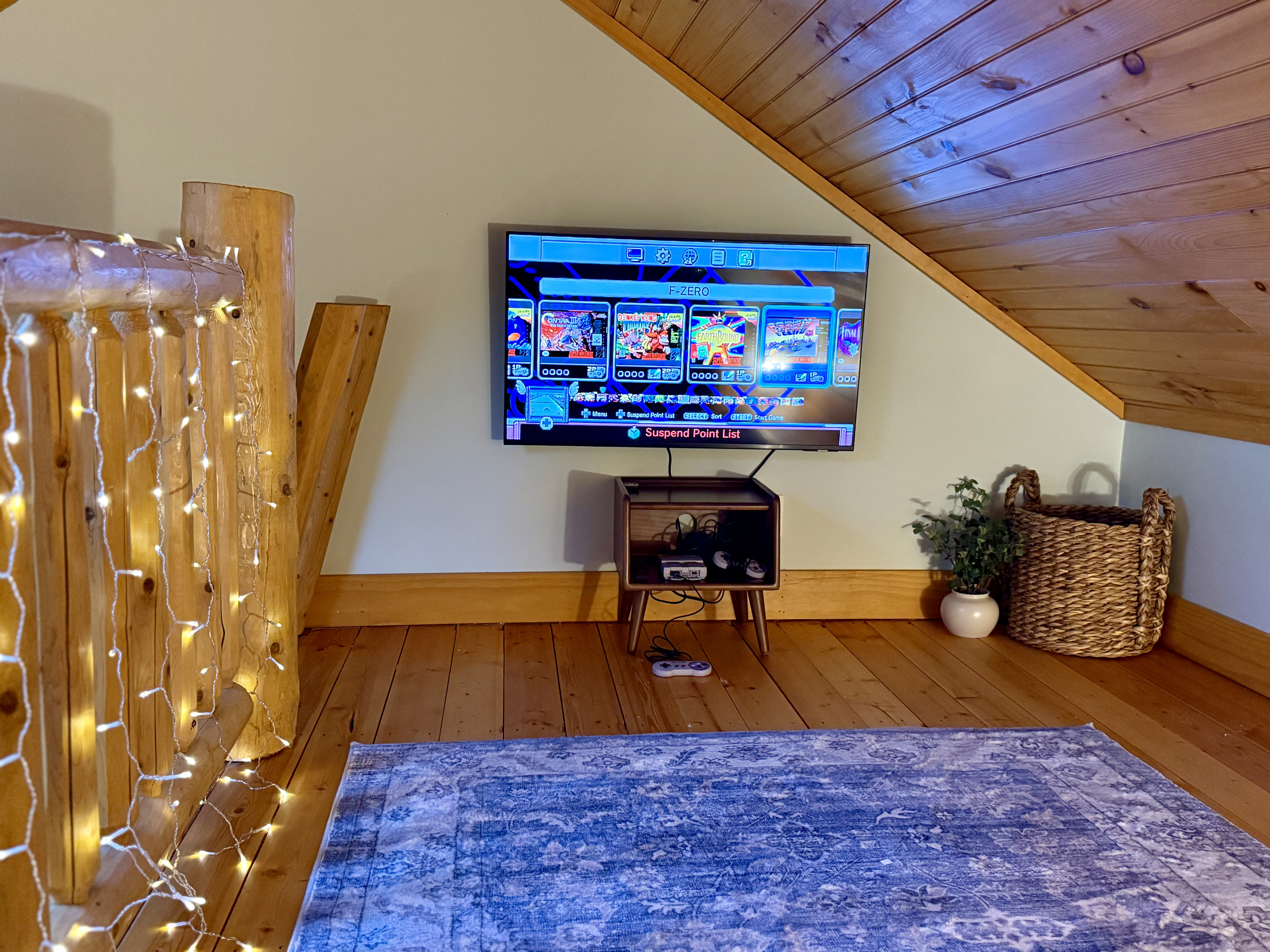 Fun loft hangout space with a retro gaming system