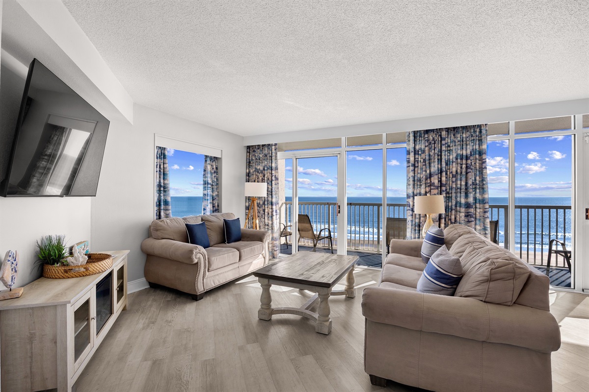 Unwind in this gorgeous living room while gazing out at the Atlantic, where beautiful water meets a breathtaking skyline.