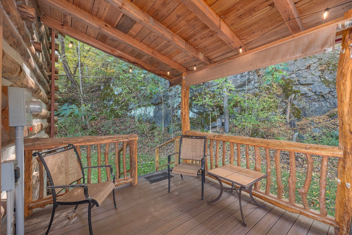 There is seating on the back porch for when you are ready to get out of the hot tub and cool off. 