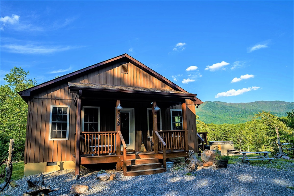 Relax on the deck and take in the quiet surroundings, where fresh mountain air and nature create the perfect escape.