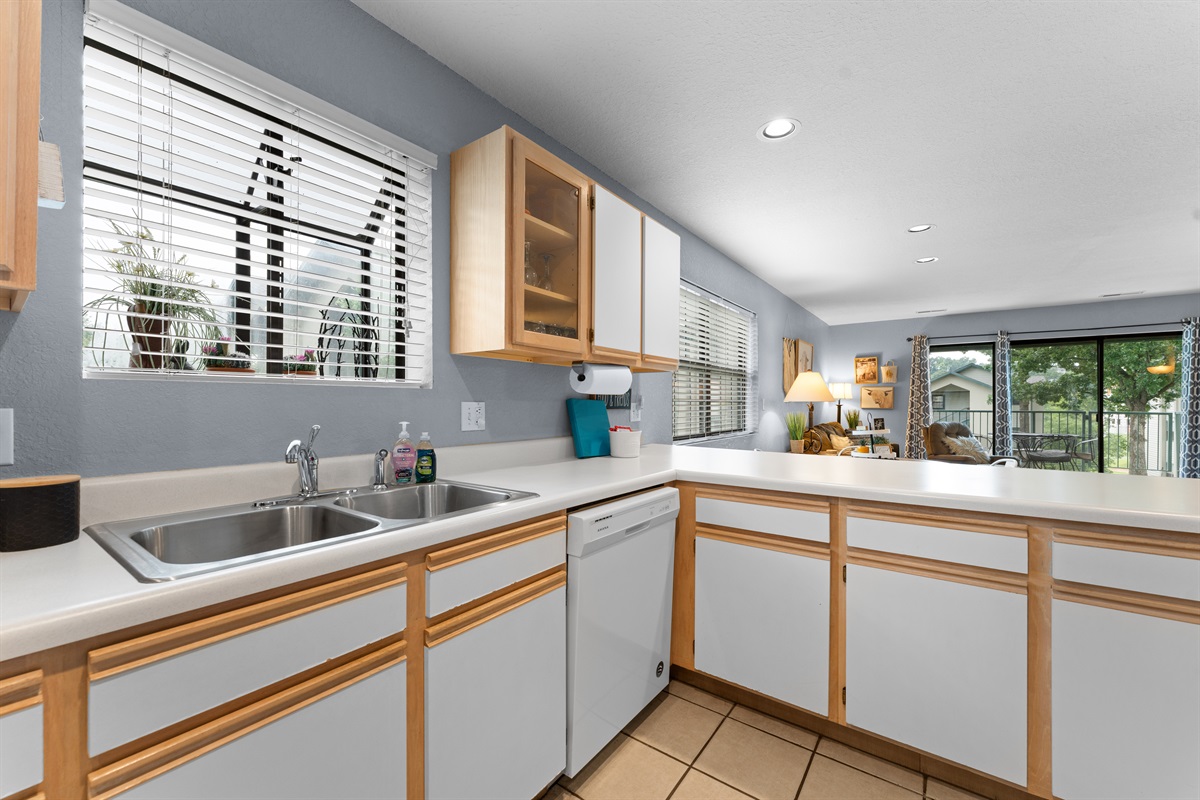 Bright counters and good prep space keep everyday meals easy.