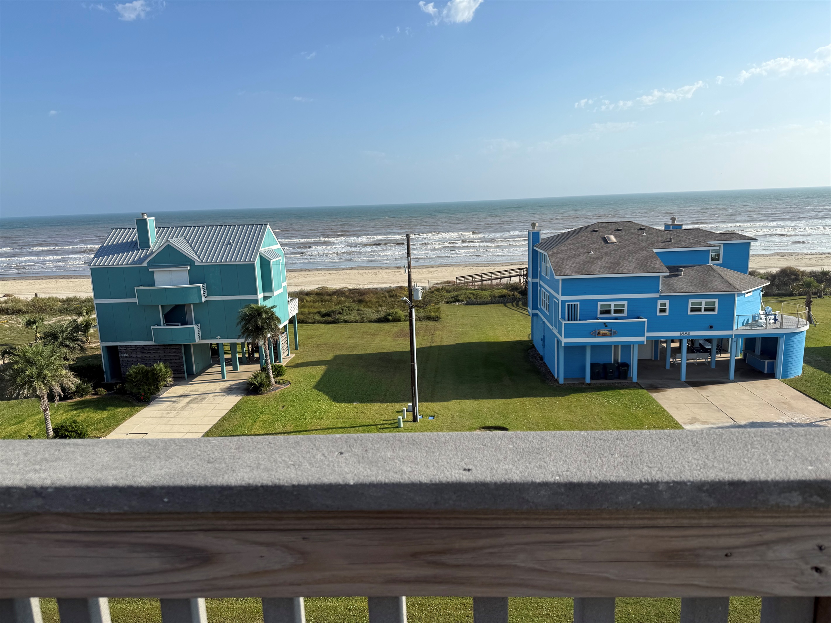 Huge views of the beach, waters, bay, and the island