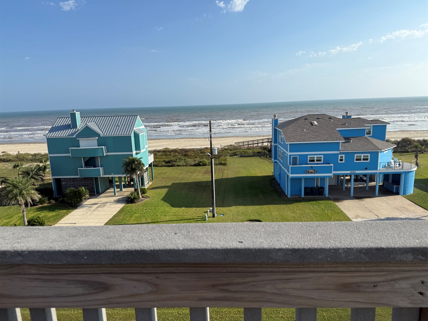 Huge views of the beach, waters, bay, and the island