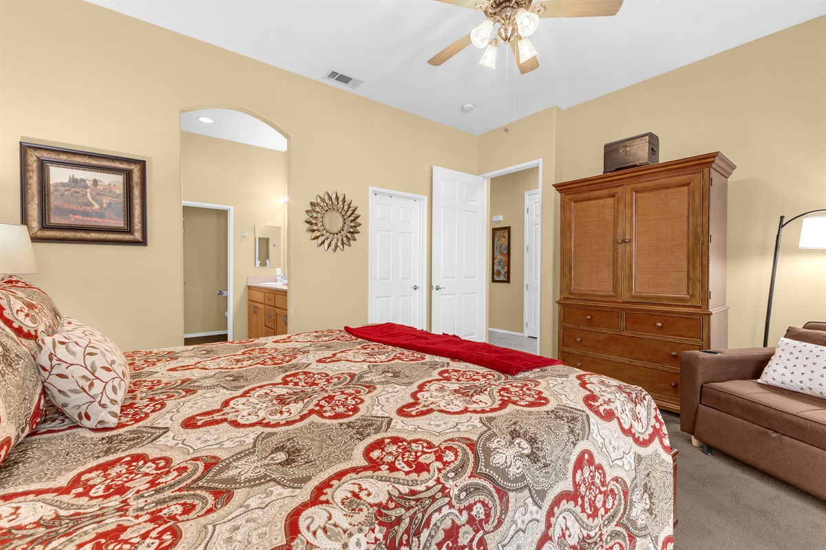 Master bedroom with cable tv and storage
