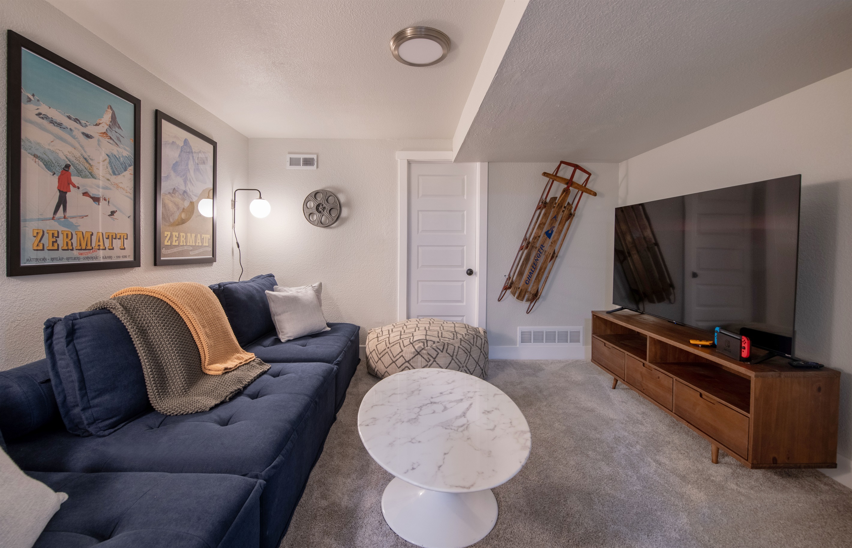 Lower level movie room and living area.