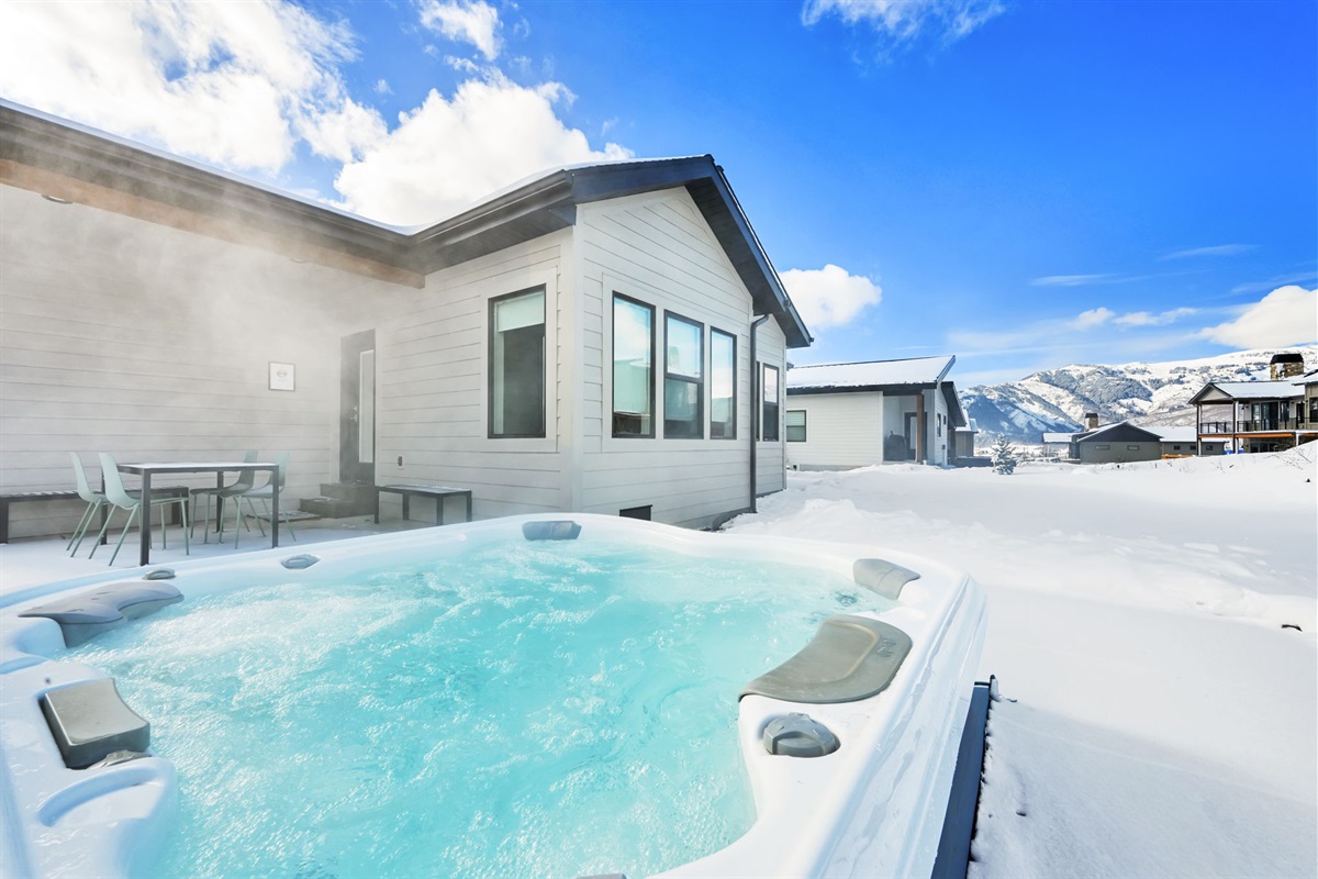 Patio with outdoor seating—perfect for relaxing and enjoying fresh mountain air.