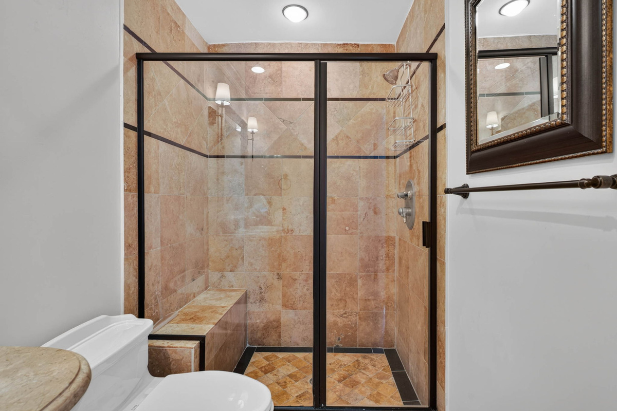 Bathroom 2: ensuite bath in bedroom 2, single vanity & shower