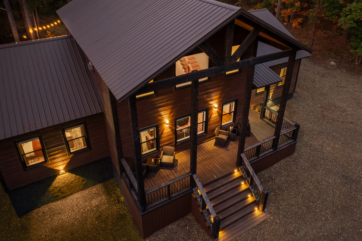 A serene aerial view showcasing the cabin’s peaceful wooded setting and total privacy. Your own forest getaway.