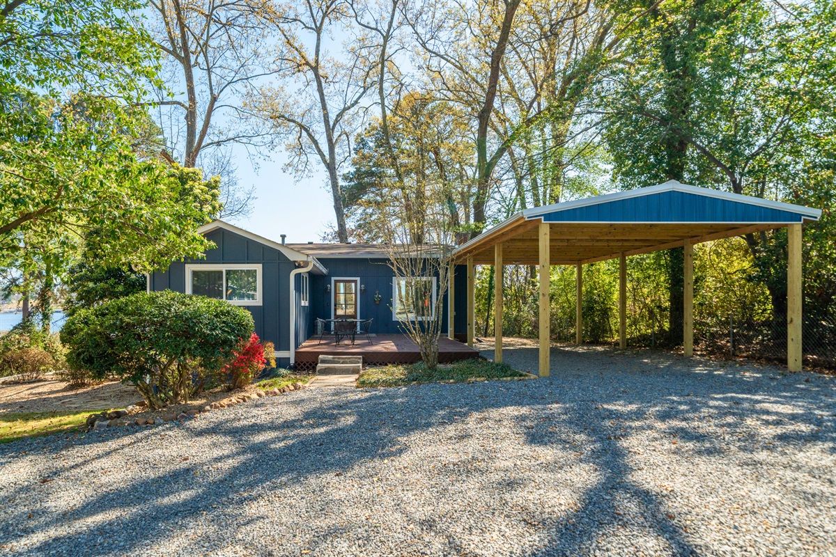 Arrive at the main house where a charming exterior and peaceful surroundings set the tone for a relaxing getaway from the moment you pull in.