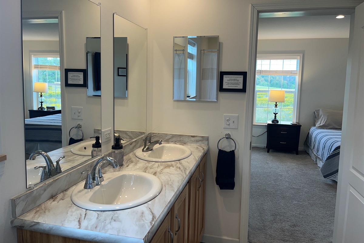 Main level primary bedroom ensuite bath