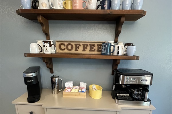 Coffee Bar- stocked with starter supply of coffee, creamer, sugar, and hot coco.