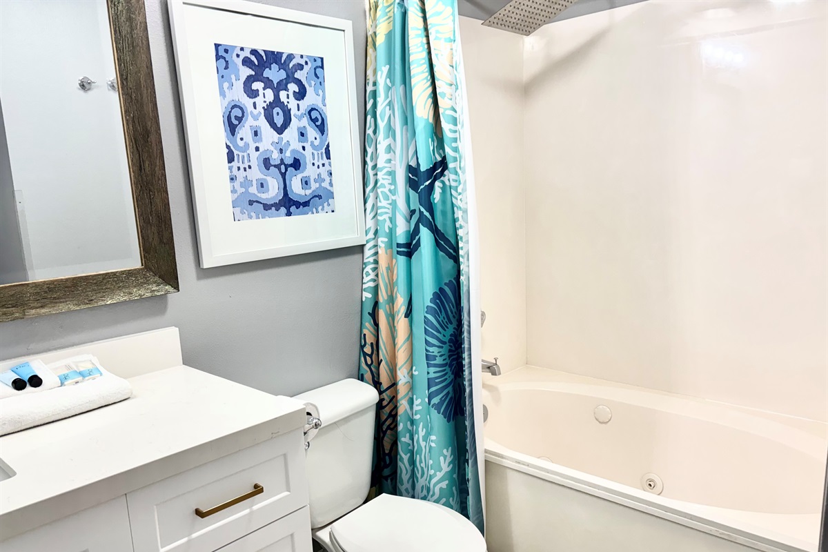 Primary bedroom ensuite bathroom with rain shower head