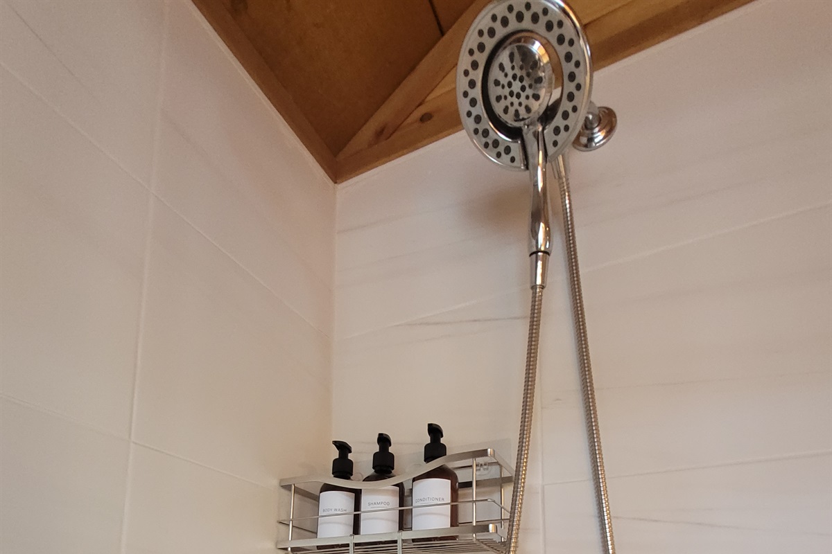 Shower head in bathroom shower enclosure
