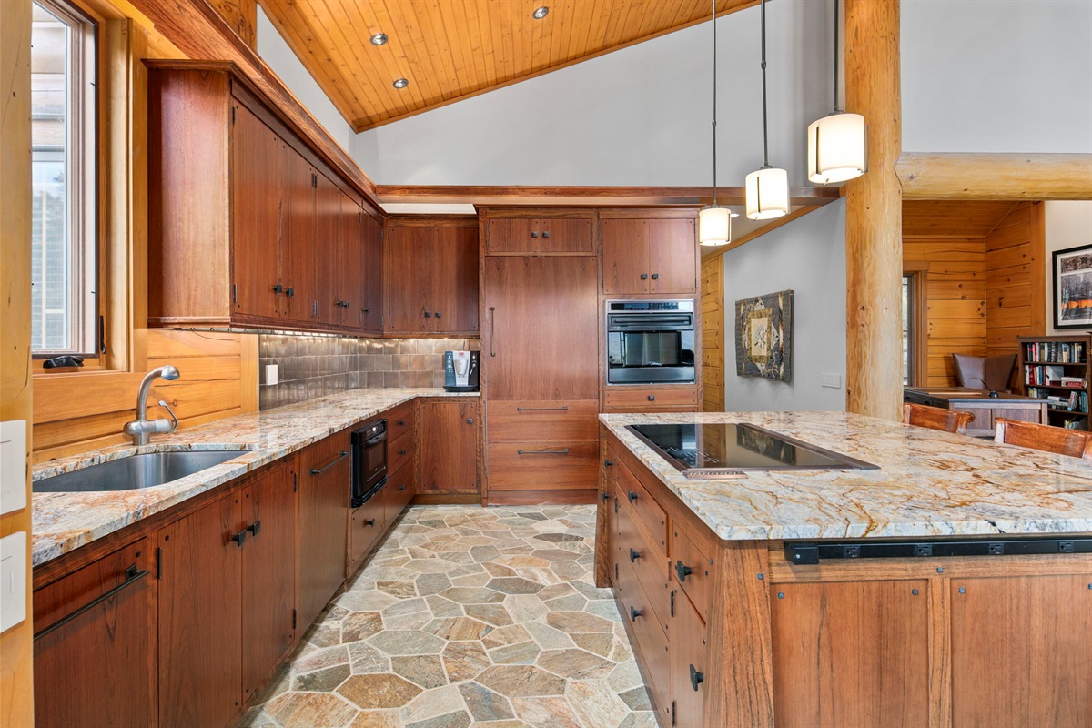 Miles of countertops, custom touches everywhere, wall oven and microwave