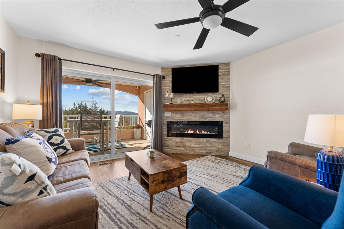 Cozy living room with fireplace and Smart TV.