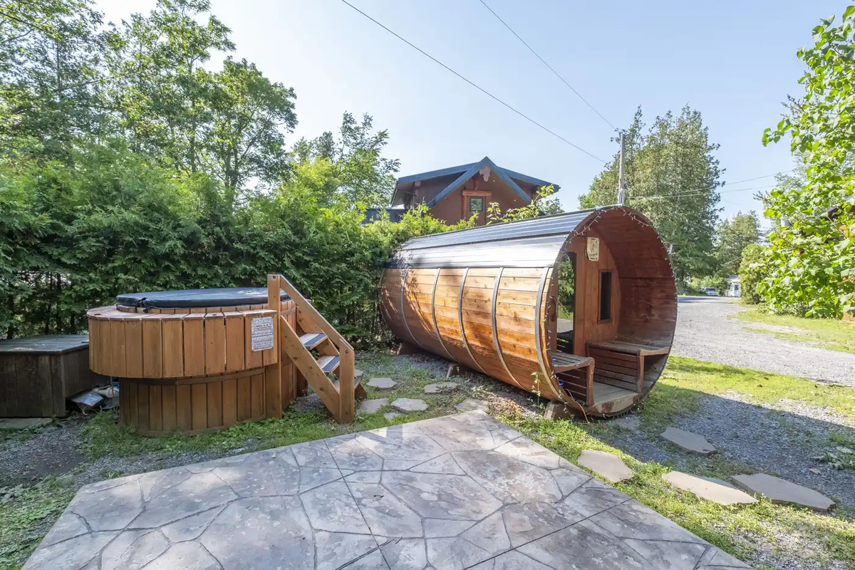 Private barrel sauna and hot tub beside Cottage #5