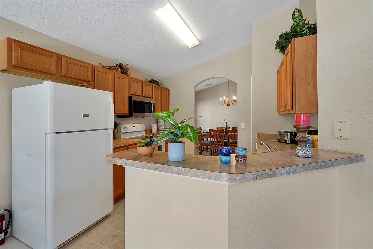 Keep drinks cold and snacks fresh in the full-size fridge—perfect for a stress-free, budget-friendly vacation