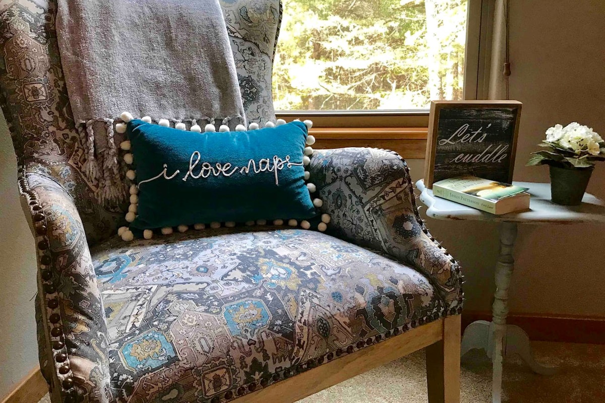 Reading nook in master.  Open the window to hear creek in back yard