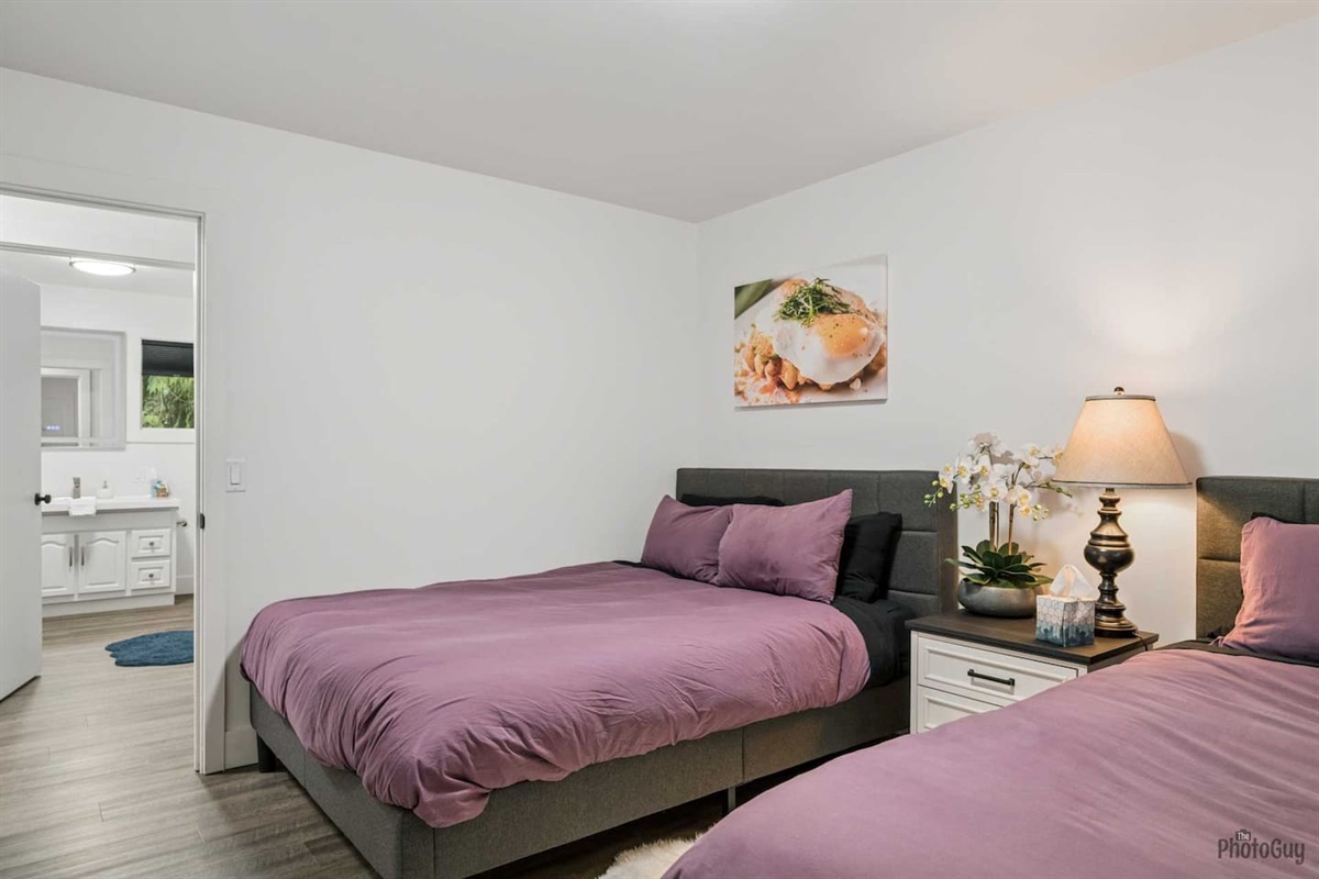 Double queen bedroom with closets