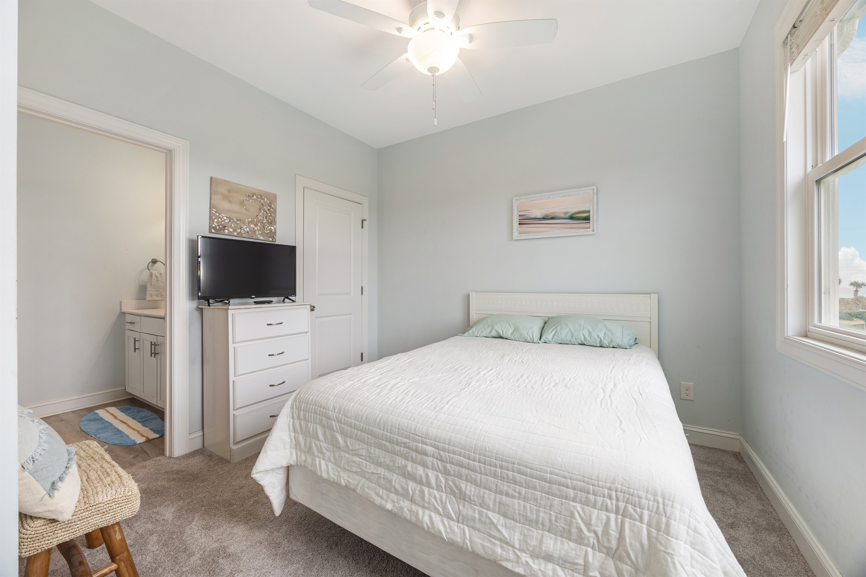 Private queen bedroom with ensuite bathroom.