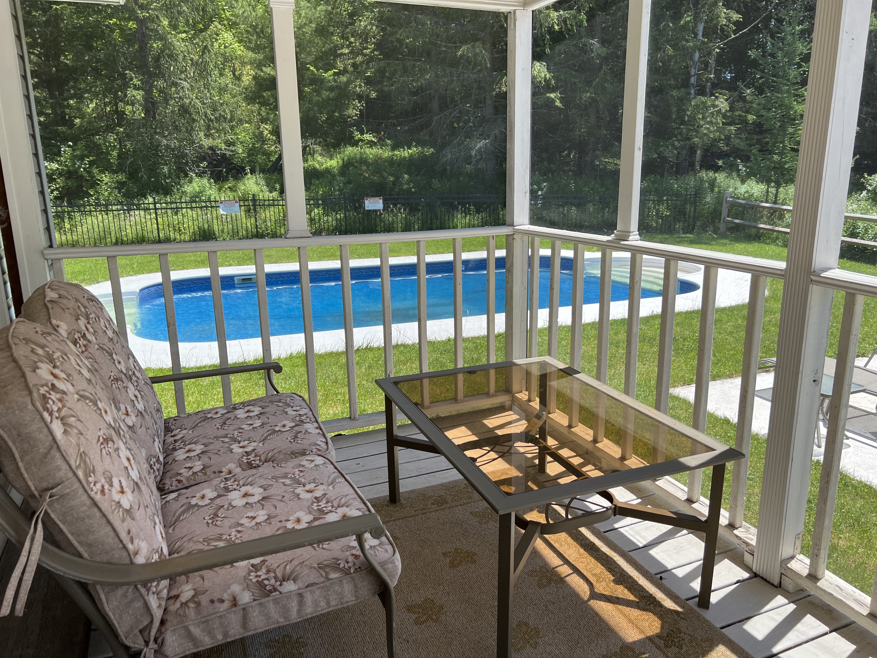 Screened in porch with pool view  (POOL CLOSED for season in September)