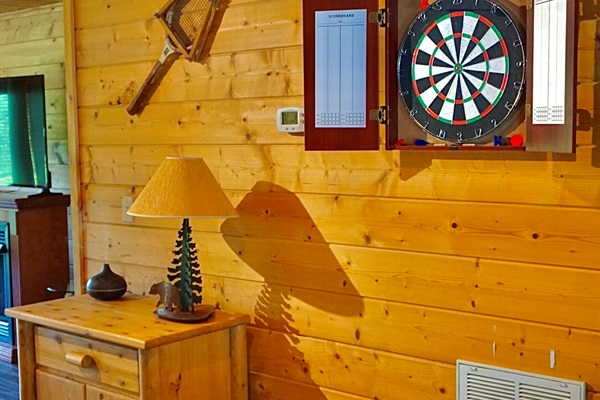 Game Room: Unwind with a friendly dart match and rustic charm on your getaway!