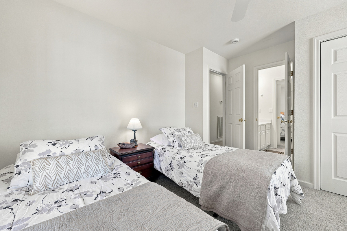 Another look at the two-bed room, with direct access to the shared bath.