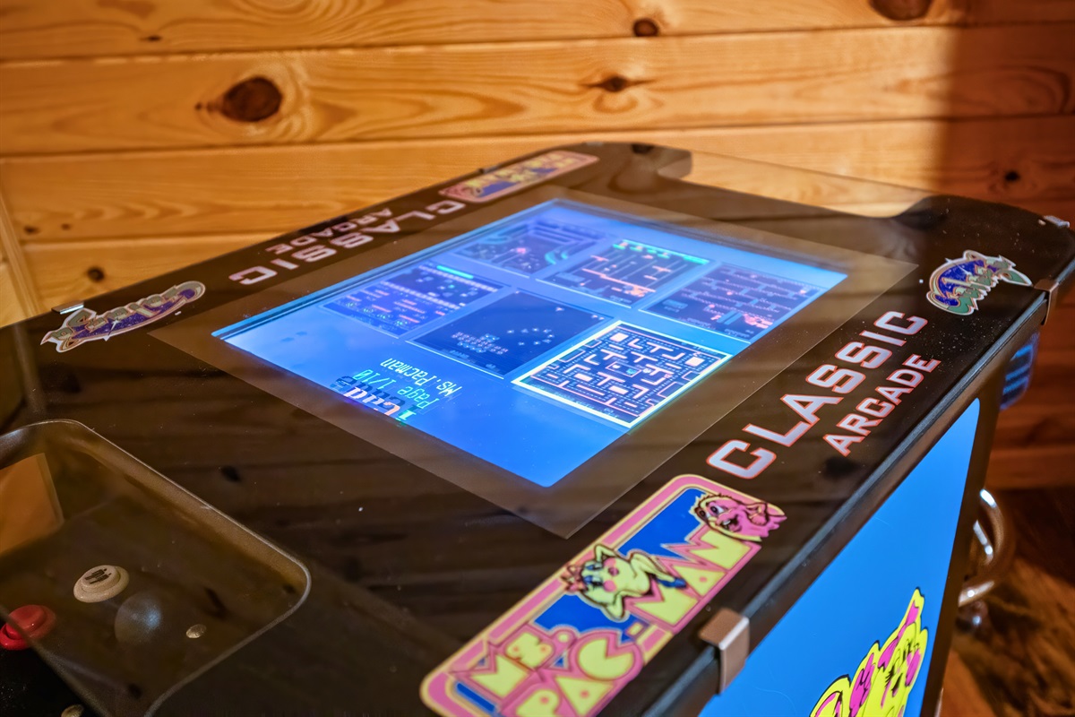 Classic arcade machine with retro favorites like Pac-Man and Galaga — great for nostalgic gaming fun.