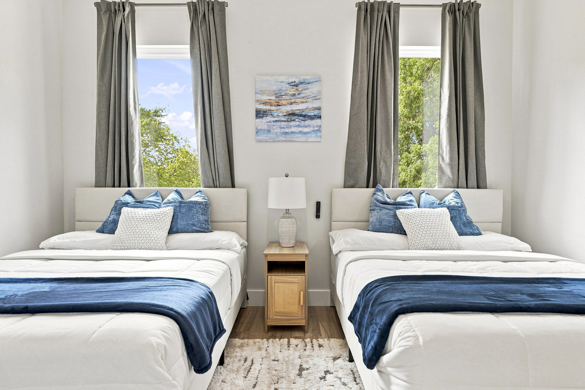 Bright and airy, with plush bedding and lovely views for a refreshing stay!