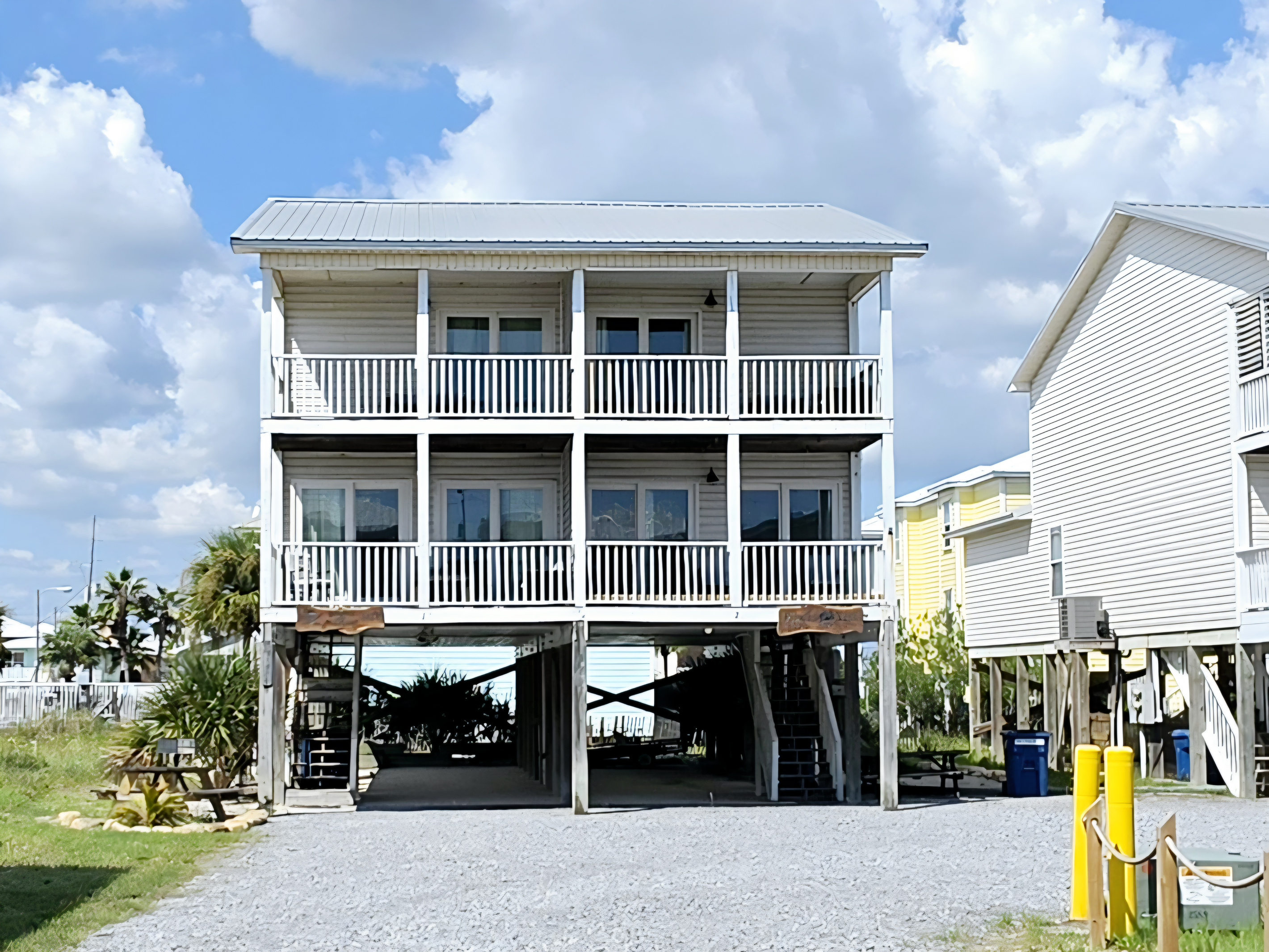 Both sides of the Pirates duplex, with covered balconies on both levels