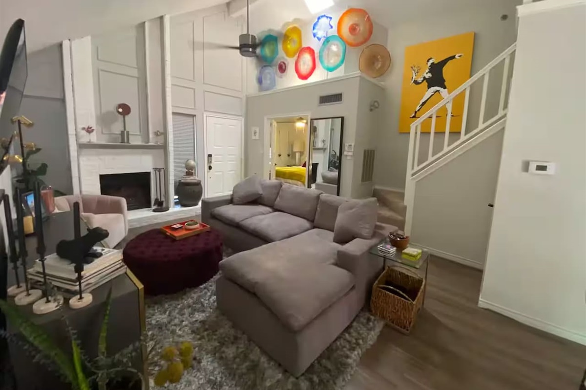 Living room with cozy sectional and  TV.