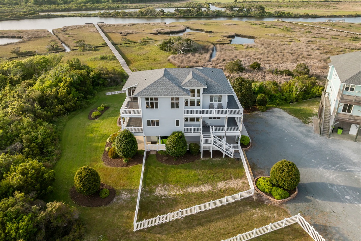 Direct access to the private boardwalk leading through the marsh to the water