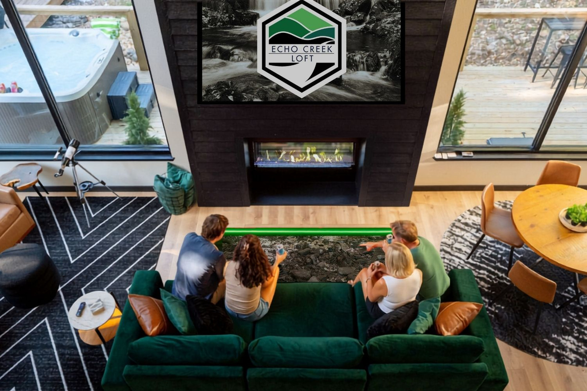 Look through the signature glass floor to the natural creek bed directly beneath the cabin.