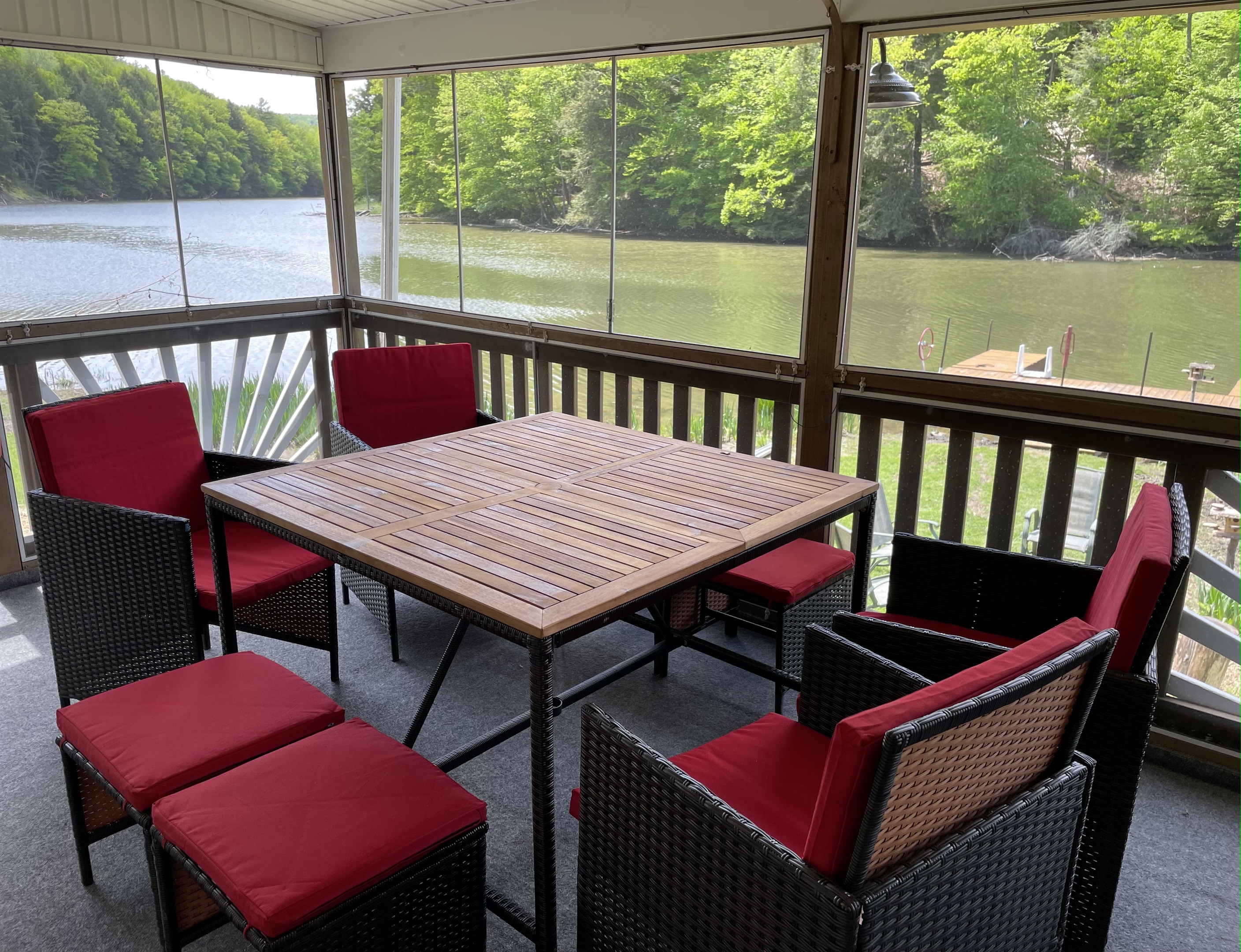 Enjoy time in the screened in porch overlooking the water