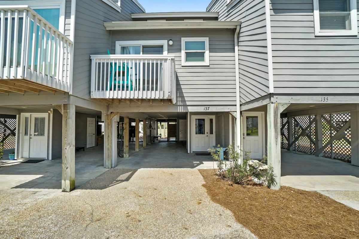 Park under the carport and you're already home &mdash; the entrance to Take A Paws is right there.