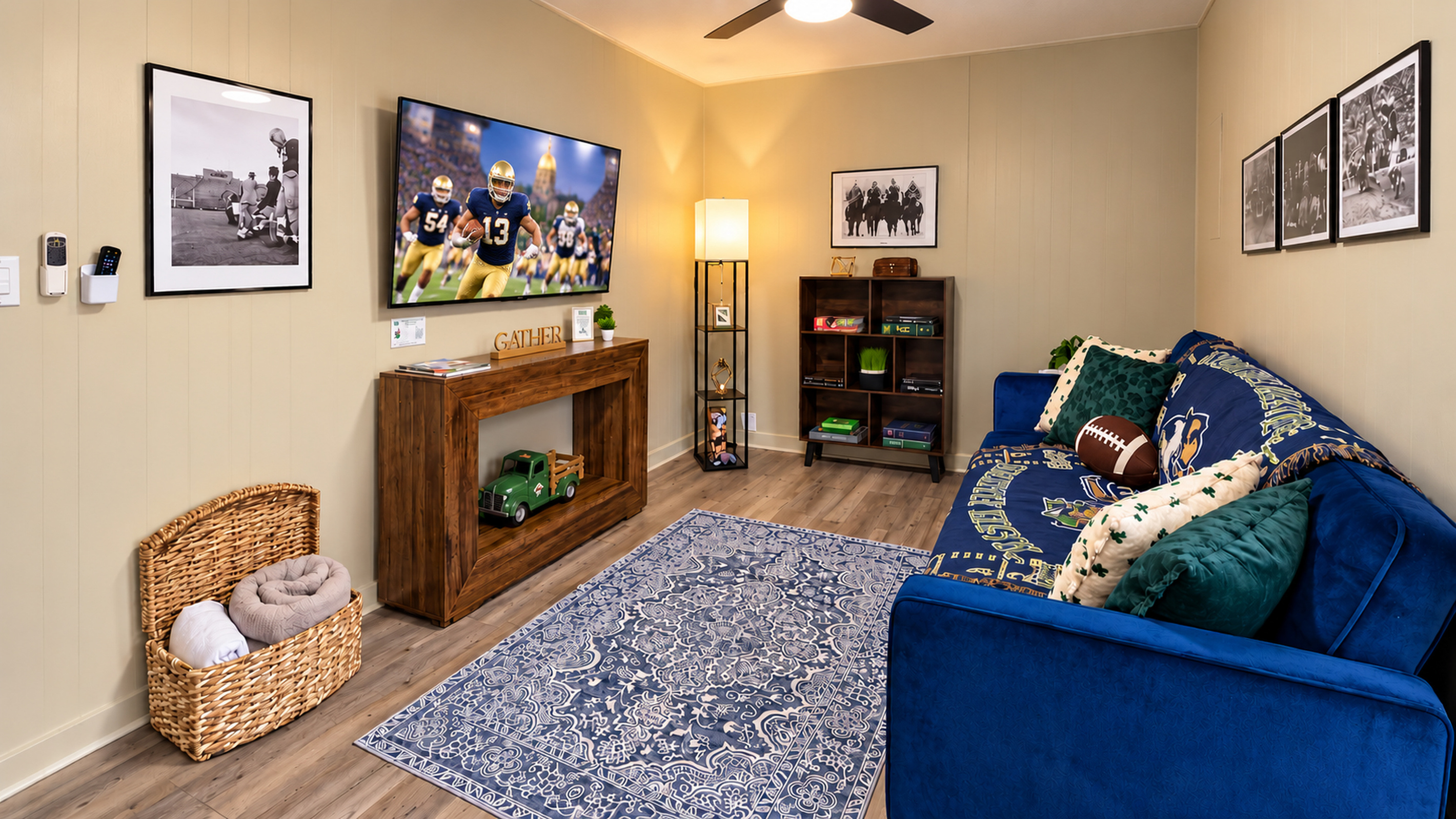 Notre Dame-inspired den with 55-inch TV, sleeper sofa, and plenty of Fighting Irish spirit!