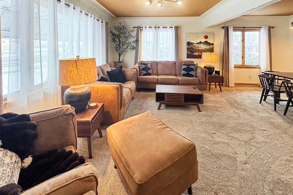 Your home base: spacious living room with oversized TV and room for everyone