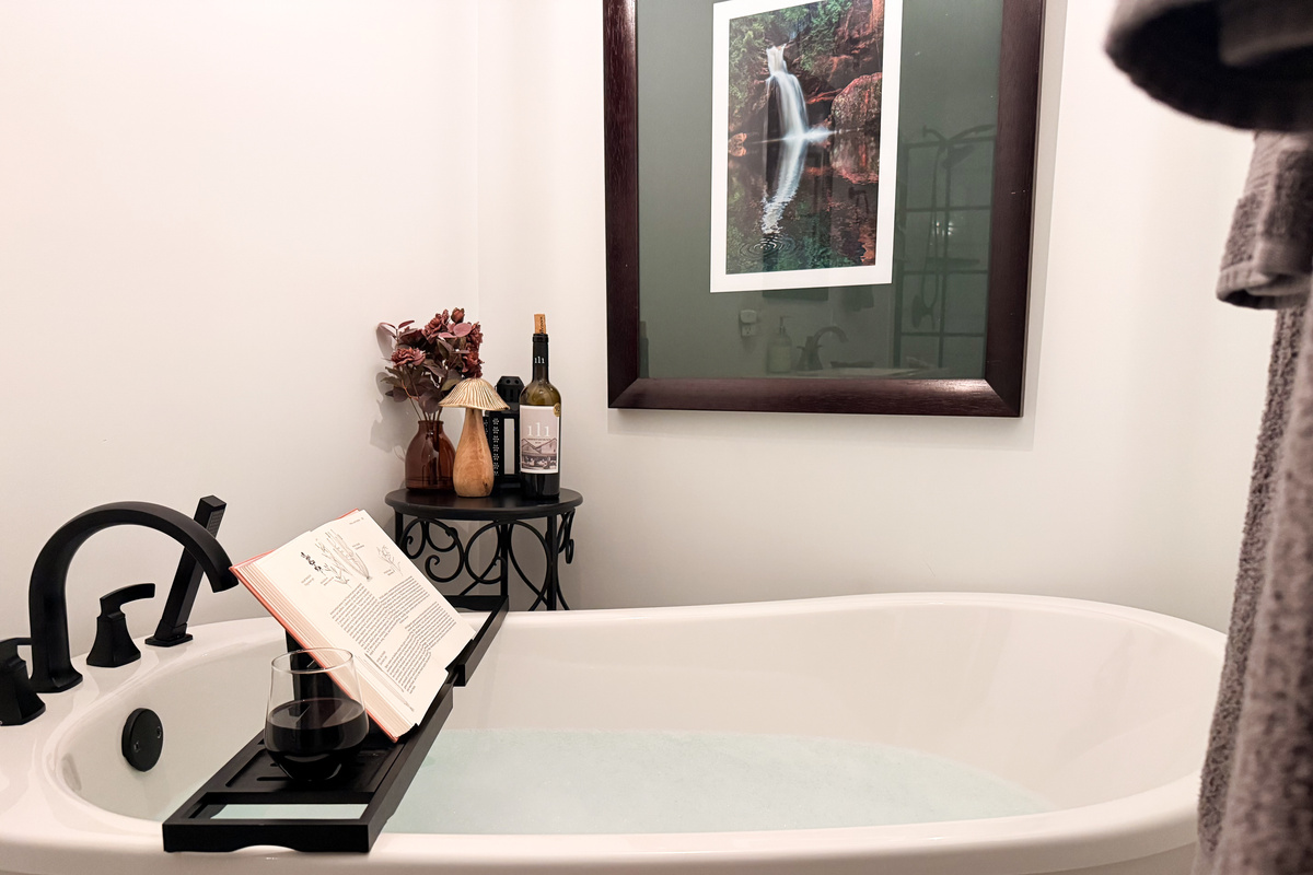 The primary bath has a lovely soaking tub to relax in.