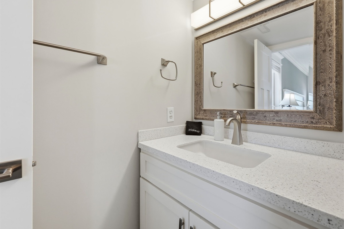 Clean and modern bathroom with updated coastal finishes