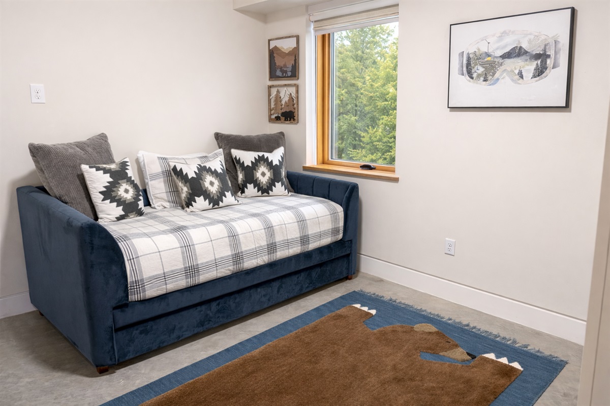 First-floor bunk room with futon and trundle