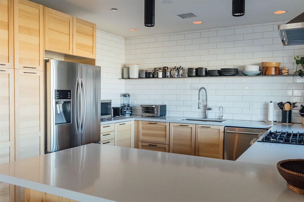 Large variety of appliances: Coffee maker, Zojirushi rice cooker, waffle iron, french press, locally roasted coffee beans and grinder, Vitamix blender, mini oven, standard toaster + spices and oils for your convenience.