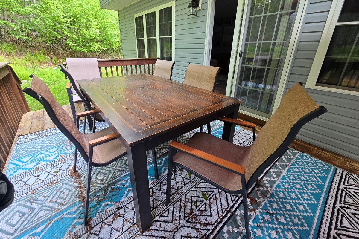Rear deck with BBQ, propane fireplace and seating