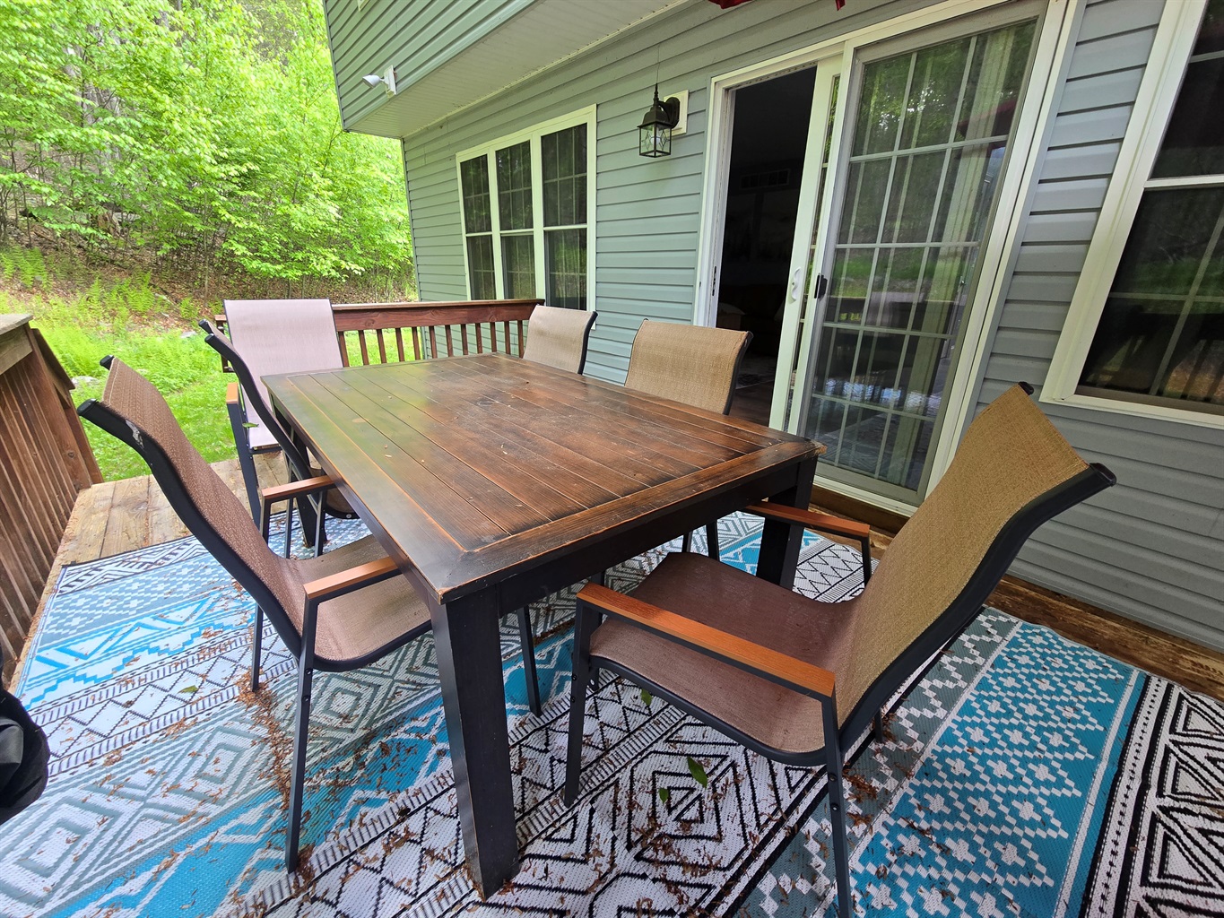 Rear deck with BBQ, propane fireplace and seating