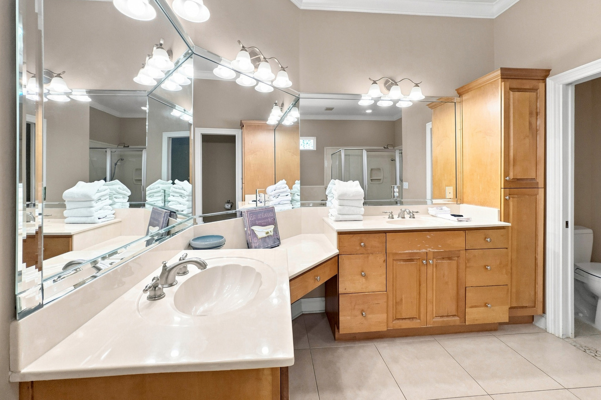 Bathroom with a dual-sink vanity and generous storage